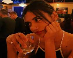 Madeleine Madden consuming alcohol